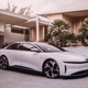 A front three-quarters view of a white Lucid Air EV